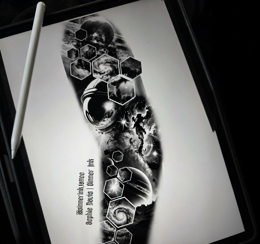 Cosmic Fragments tattoo design featuring planets and galaxies